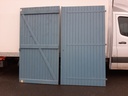 Porte de garage battante en bois (2 vantaux)